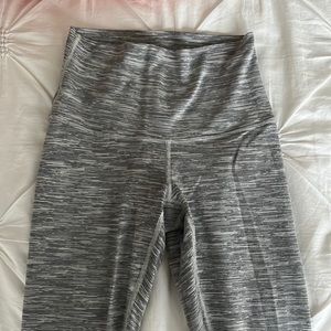 Lululemon leggings. ⅞ length with a strip of mesh at the bottom of the leg